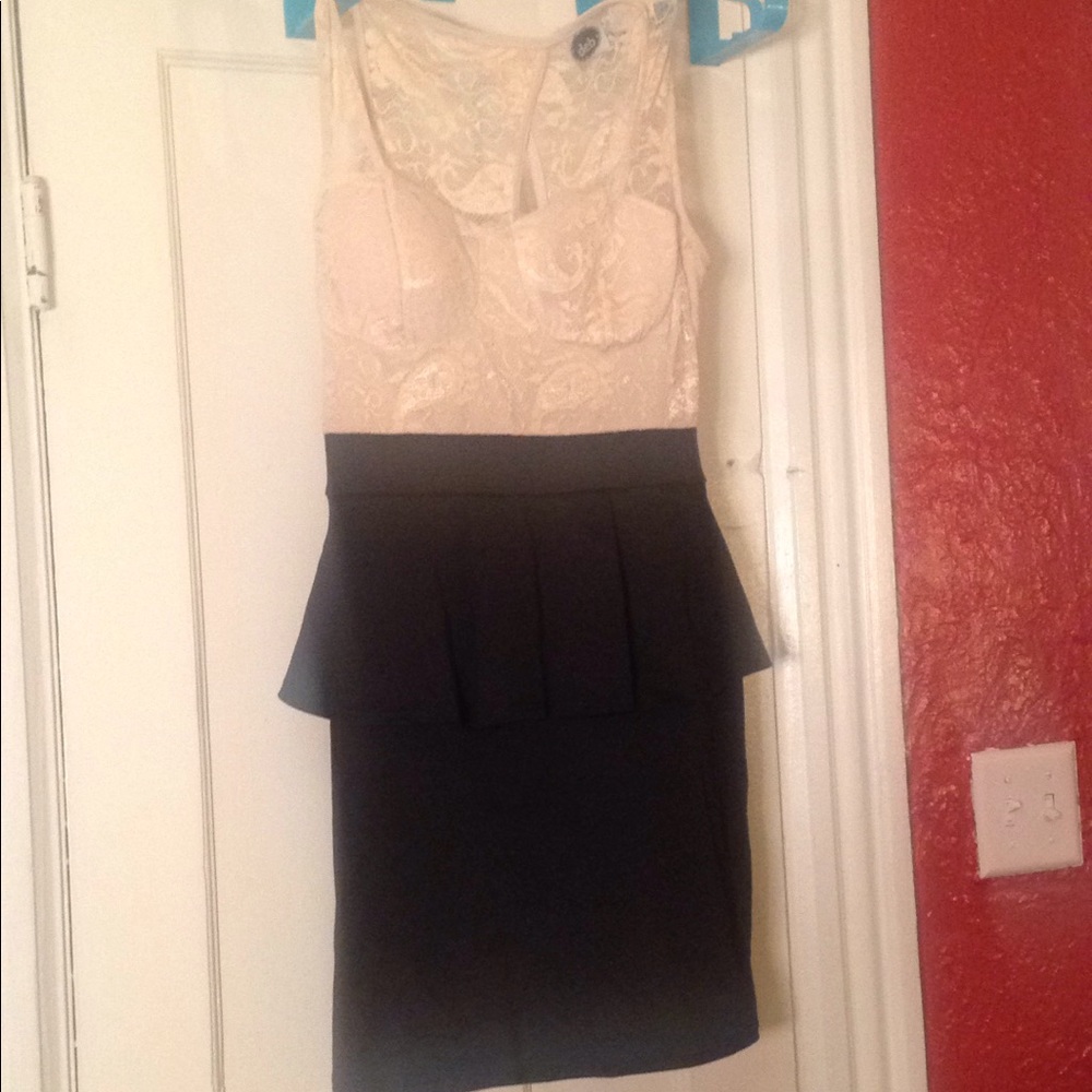Cream and black Peplum dress